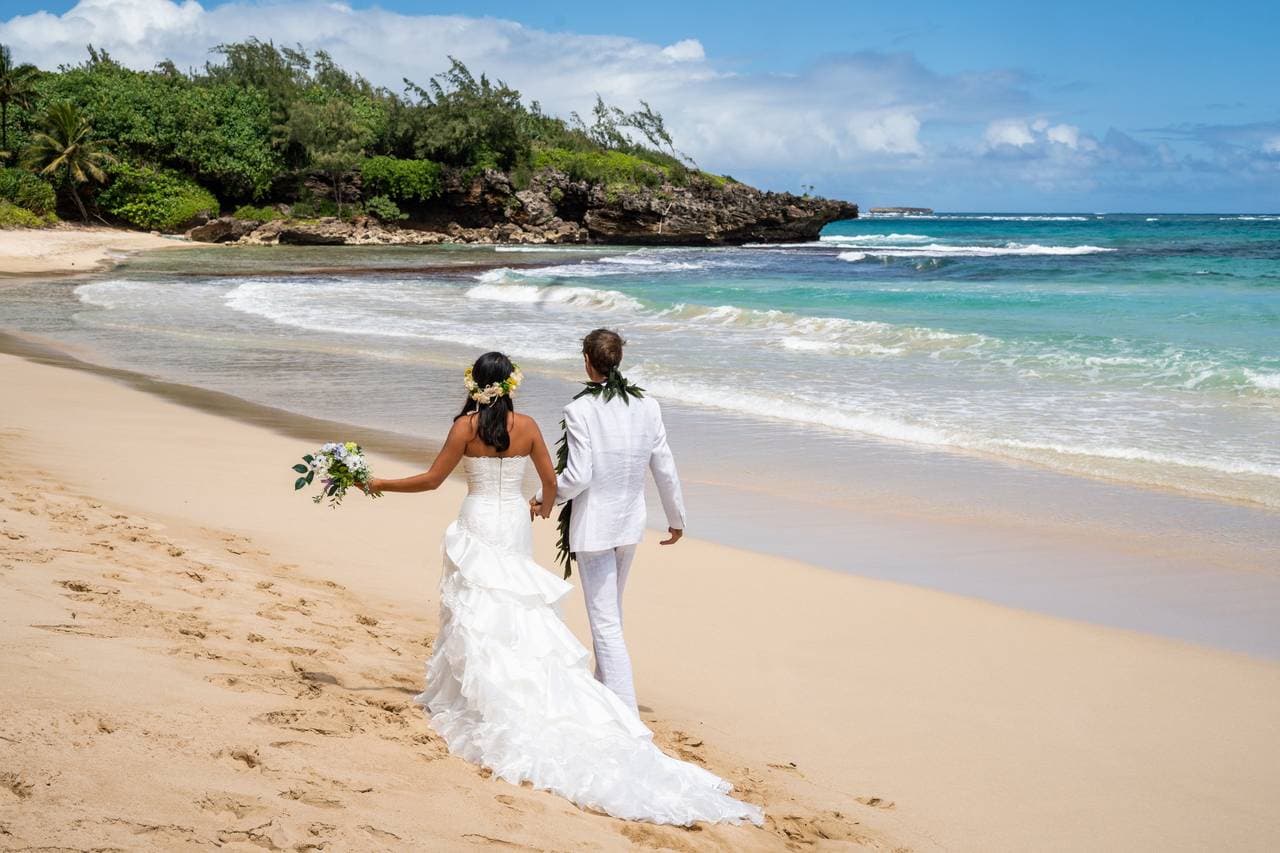 Photographer for Makani Kai Management's beachfront wedding venue in Laie, HI - Salt Drifter Photography.