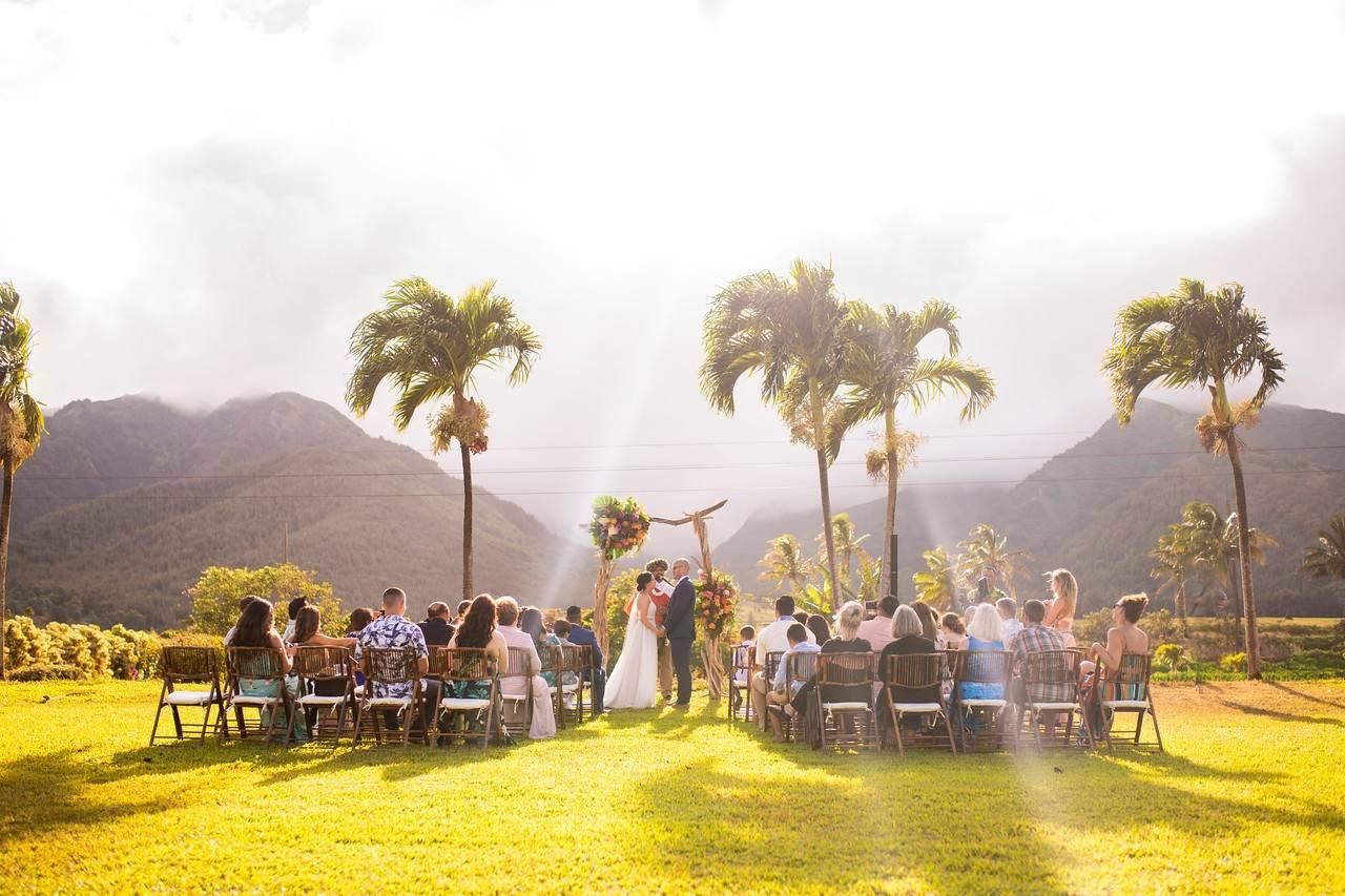 Photographer capturing wedding moments at Maui Tropical Plantation Events in Wailuku, Hawaii - Salt Drifter Photography.