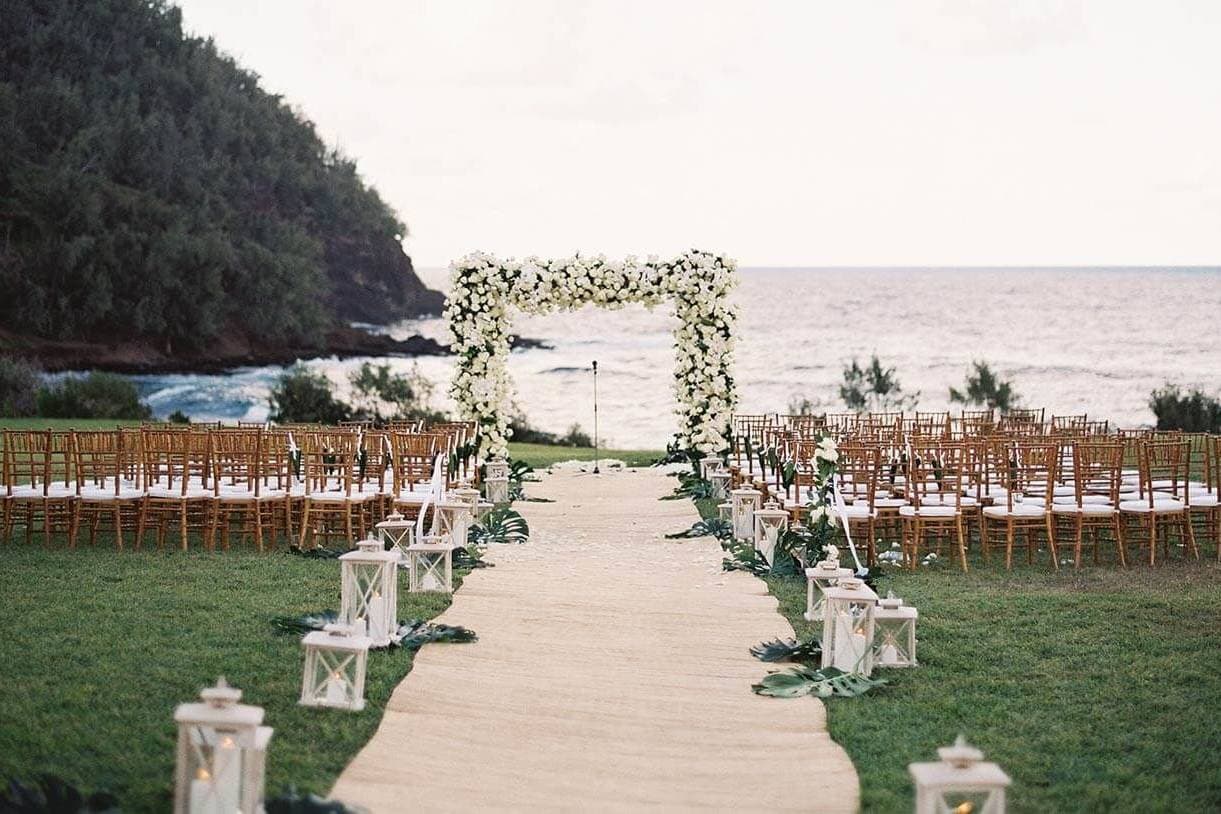 Photographer capturing outdoor Hawaiian weddings at Hana Maui Resort by Salt Drifter Photography in Maui.