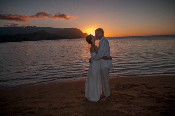 Photographer capturing romantic moments of weddings at Hanalei Bay Resort, Princeville, HI - Salt Drifter Photography - Kauai