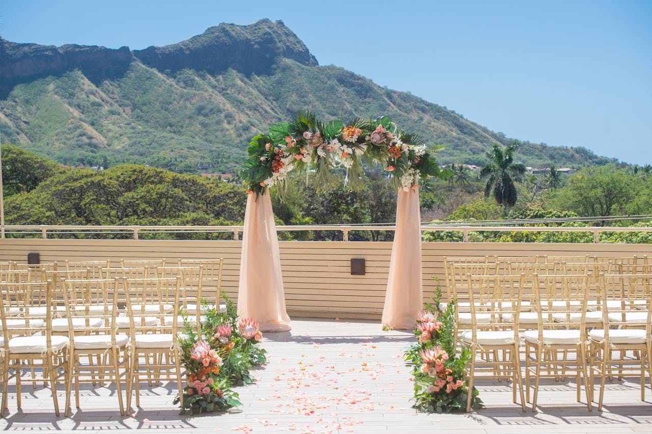 The Leahi Room & Lanai by Deck - Wedding Venue in Honolulu, HI - Salt Drifter Photography: Stunning indoor & outdoor space for up to 150 guests, locally sourced cuisine, and a historic backdrop of Diamond Head in Waikiki.